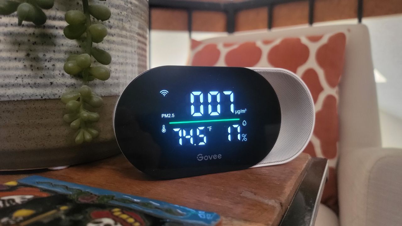 The Govee Smart Air Quality Monitor sitting on an end table.
