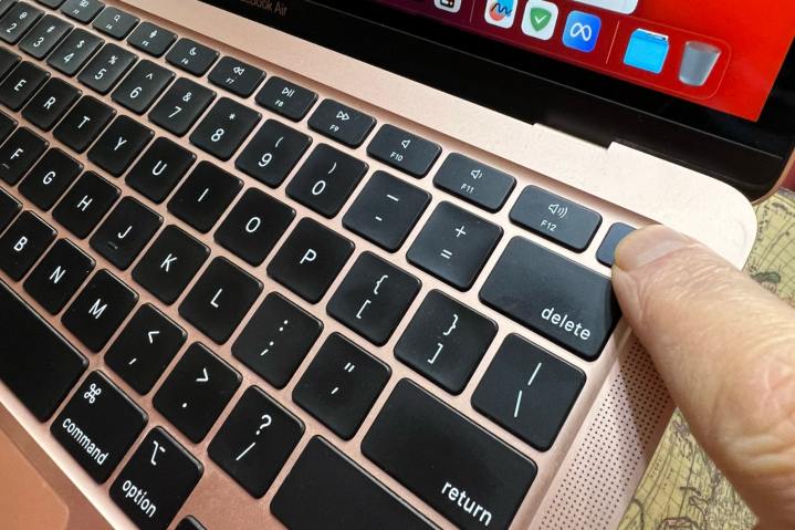 A MacBook's Touch ID sensor doubles as a power button