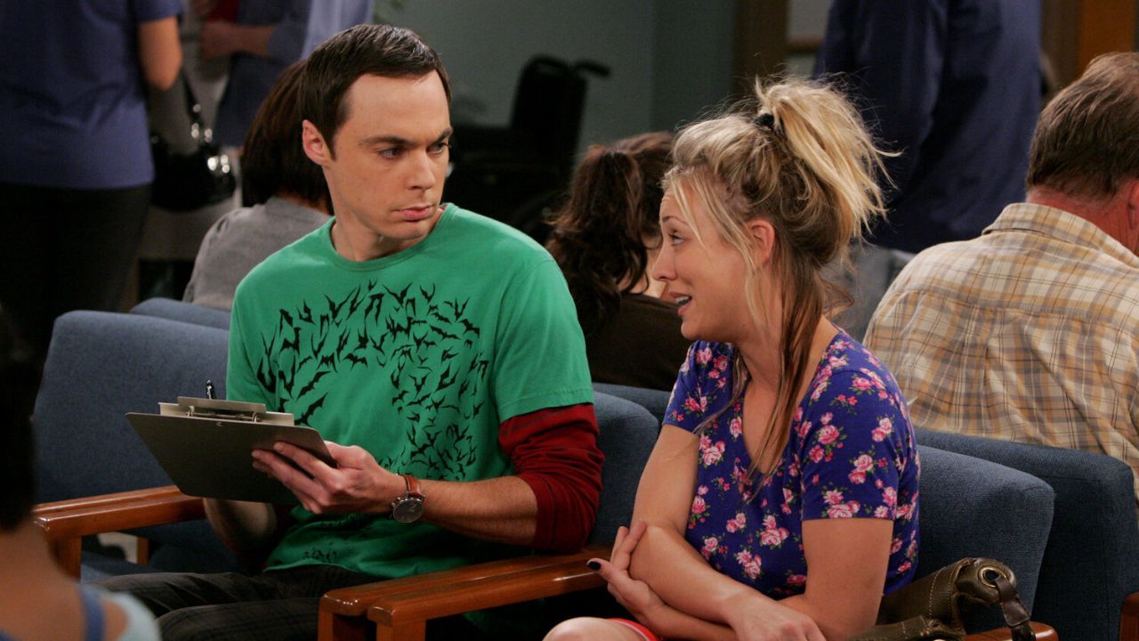 Sheldon and Penny looking annoyed in The Big Bang Theory.