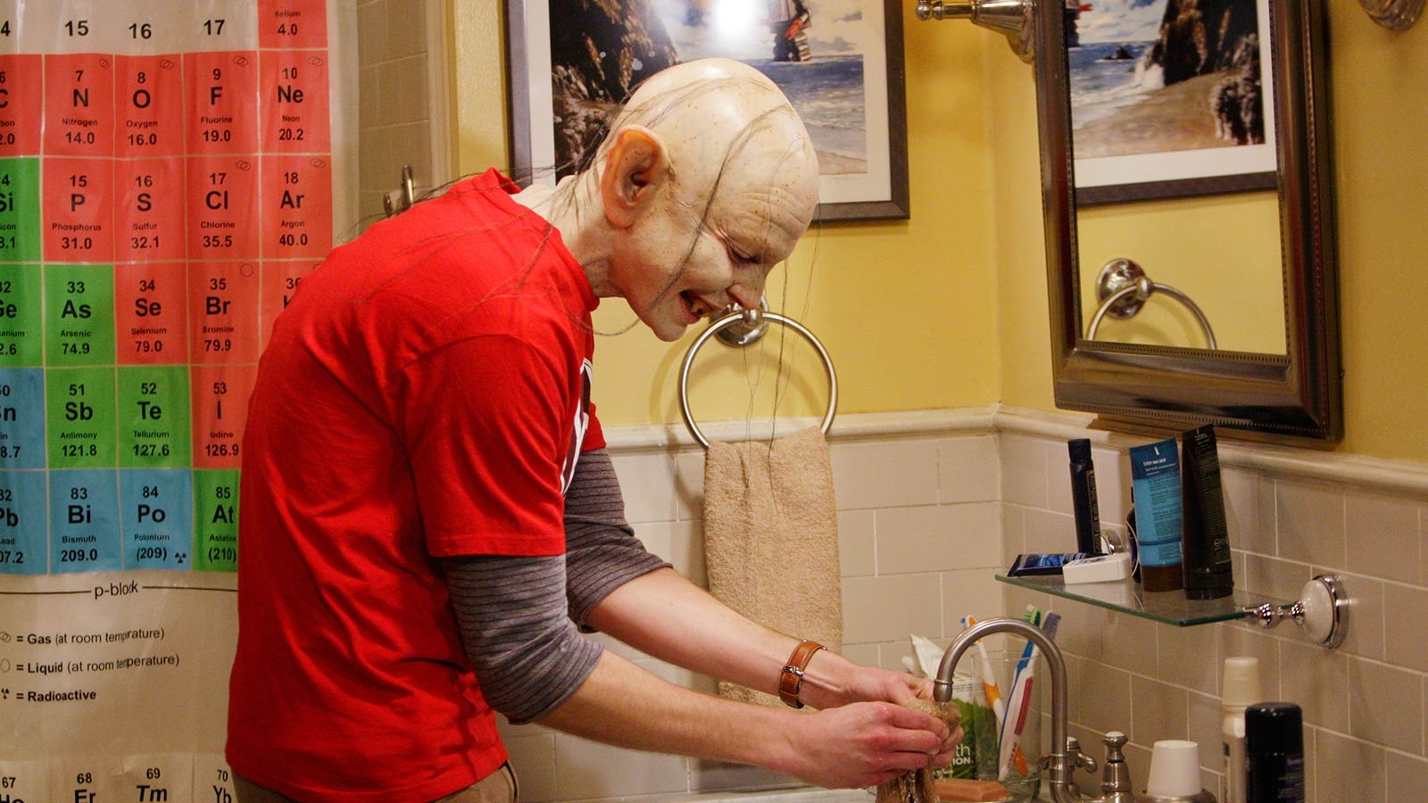 Sheldon as Gollum washing a ring on a sink in The Big Bang Theory.