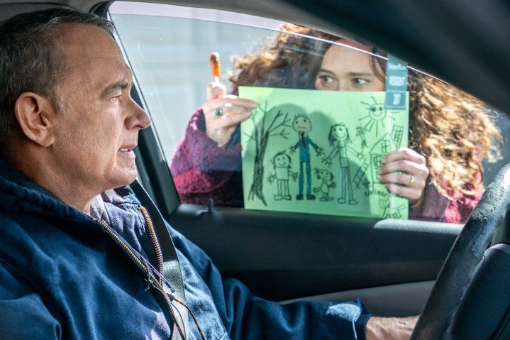 Mariana Treviño shows a drawing to Tom Hanks in A Man Called Otto.