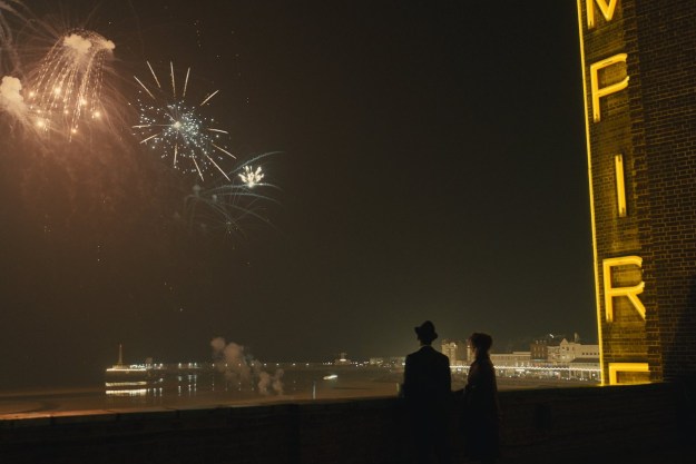 Micheal Ward and Olivia Colman look up at fireworks in Empire of Light.