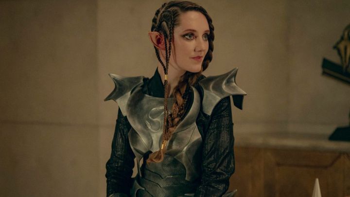 Merwyn smirking in her armor in The Witcher Blood Origin.