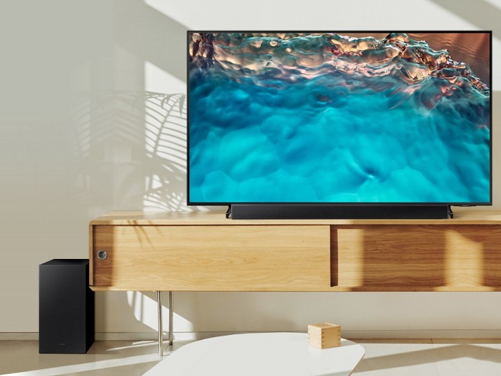The Samsung HW-B450 soundbar with subwoofer, connected to a TV in the living room.