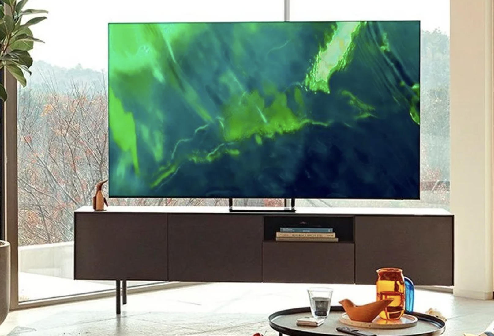 The Samsung Q70A Series QLED 4K TV in a living room.