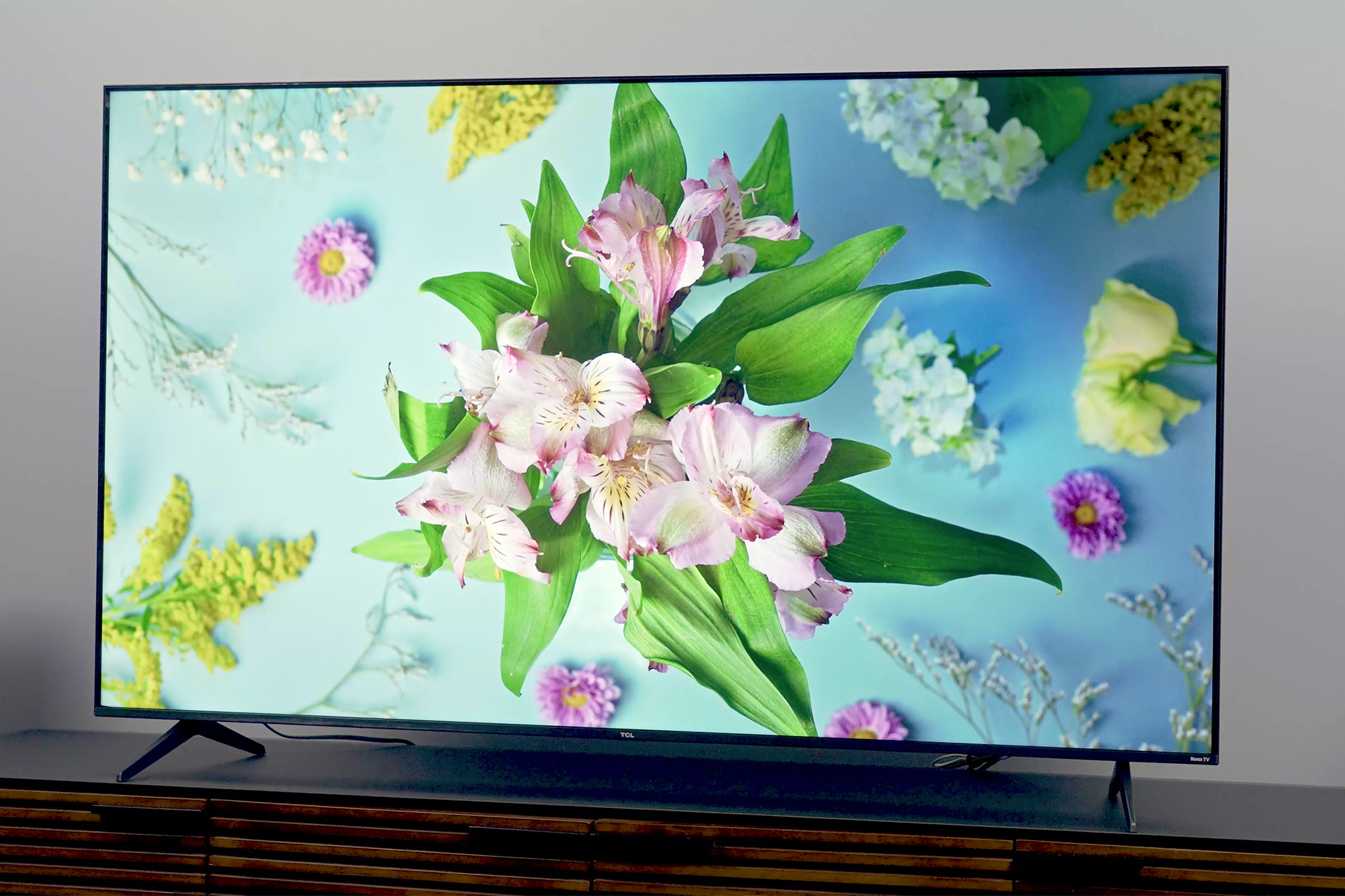 A colorful floral scene on the TCL-5 Series (S555).