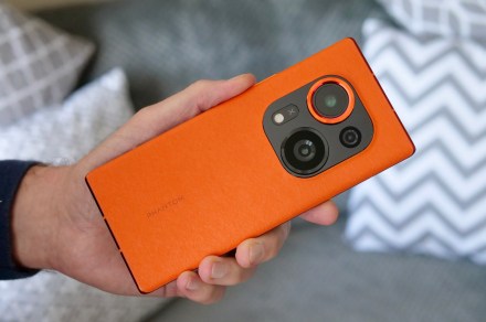 This bright orange phone has a pop-out camera unlike anything I’ve seen before