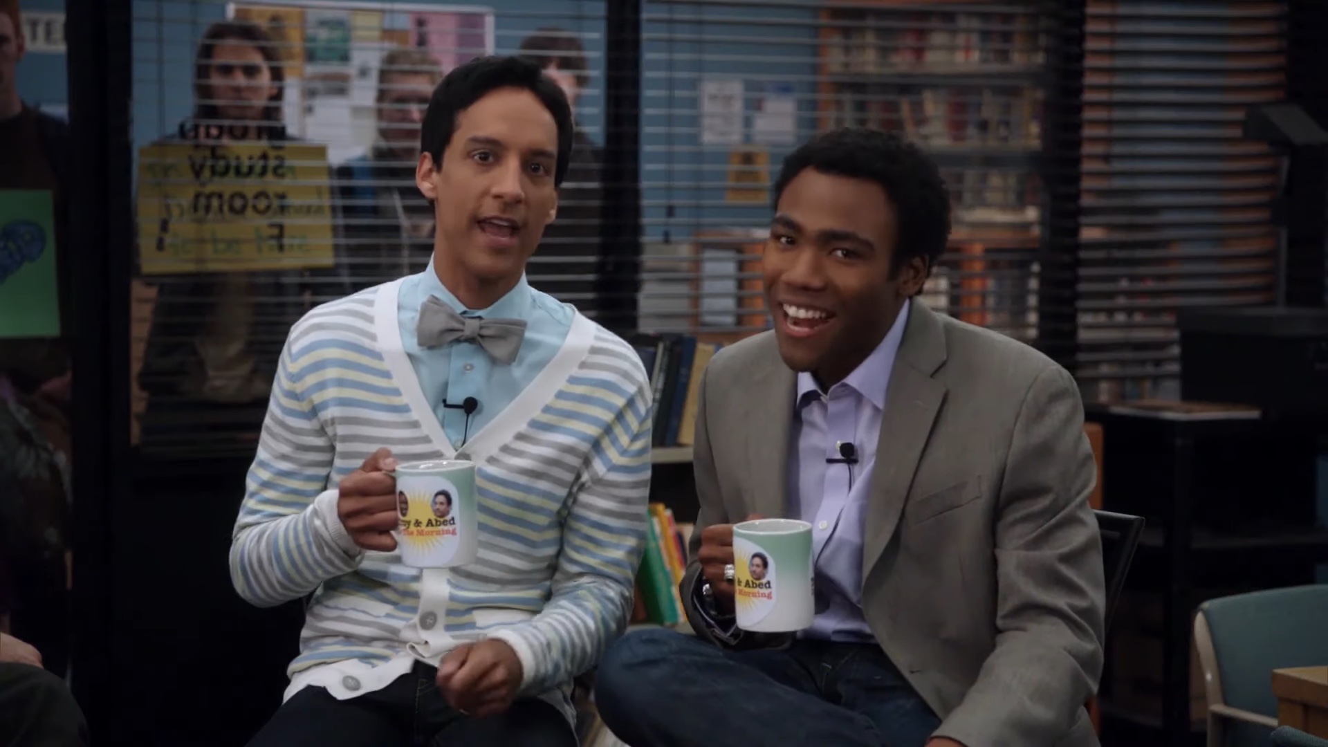 Troy and Abed holding coffee mugs in "Community."