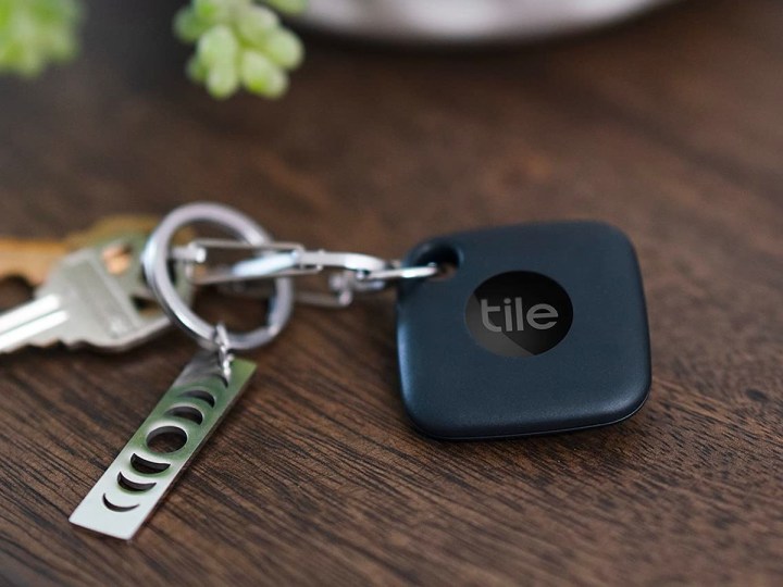 The Tile Mate Bluetooth tracker attached to a set of keys.
