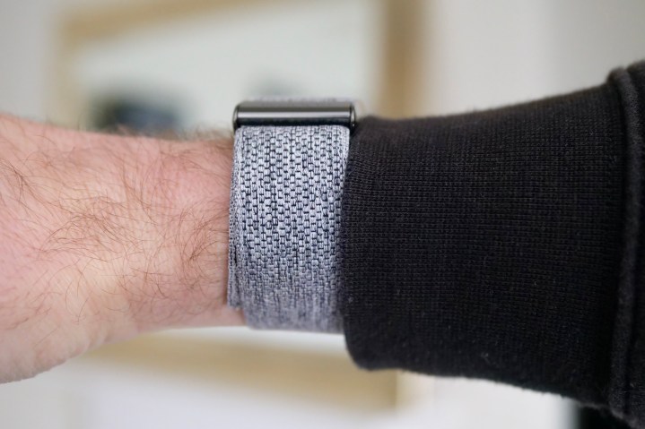 The side of the Whoop 4.0 on a person's wrist.