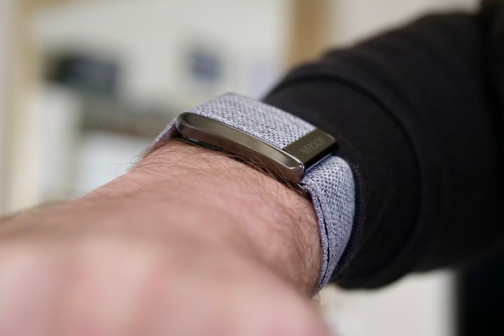 The side of the Whoop 4.0 on a person's wrist.