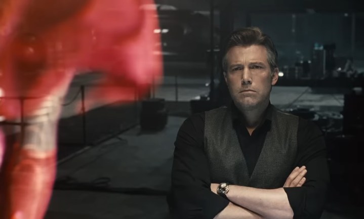 Bruce Wayne staring at a hologram of Superman in Zack Snyder's Justice League.