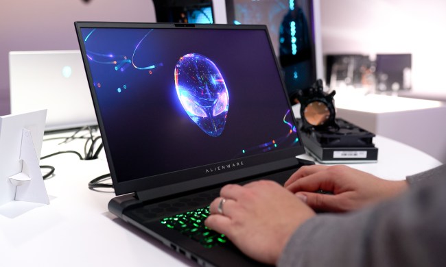 Someone typing on the Alienware m18 laptop.