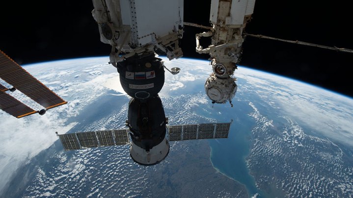 The Soyuz MS-22 crew ship is pictured docked to the Rassvet module. In the background, the Prichal docking module is attached to the Nauka multipurpose laboratory module.