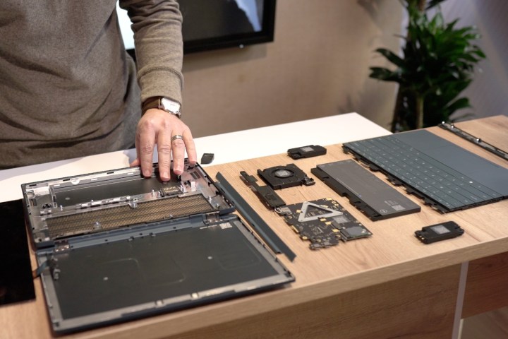 All the parts of the Concept Luna laptop laid out on the table.
