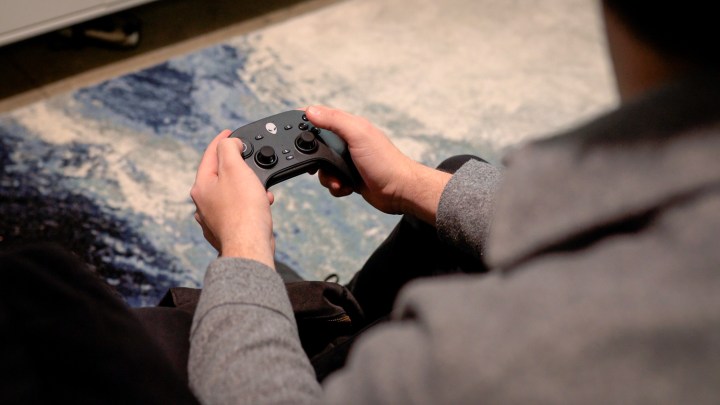 Dell Concept Nyx controller in hand.