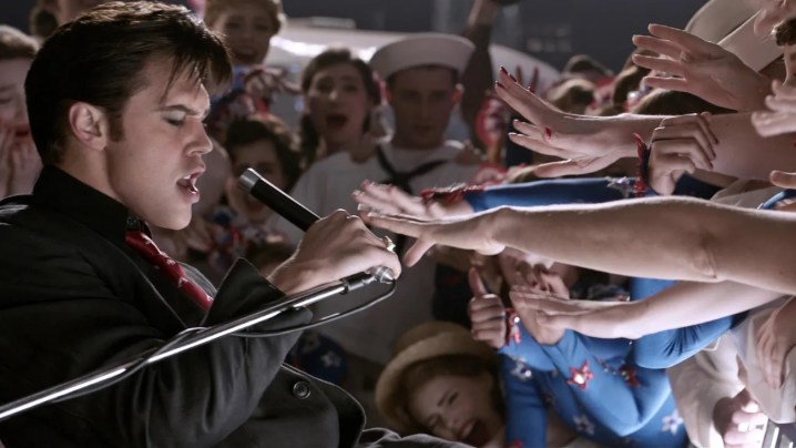Elvis sings to a crowd in Elvis.
