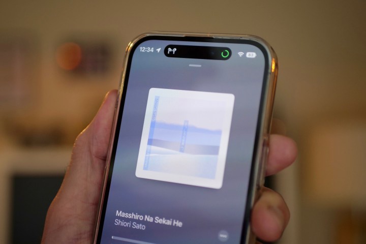 Dynamic Island connecting AirPods Pro to an iPhone 14 Pro.