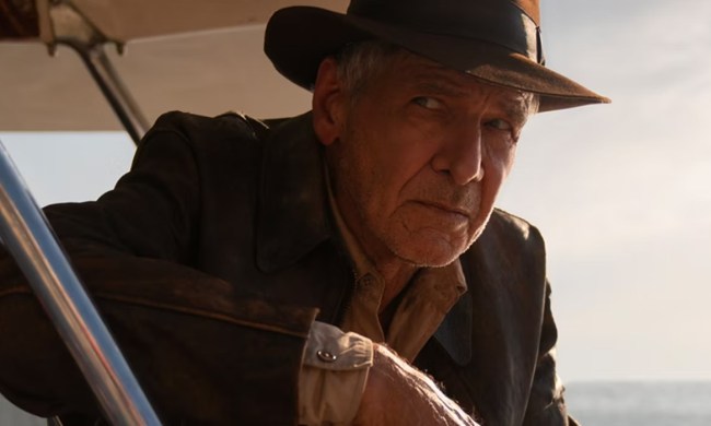 Harrison Ford looks weary on a plane in Indiana Jones 5.