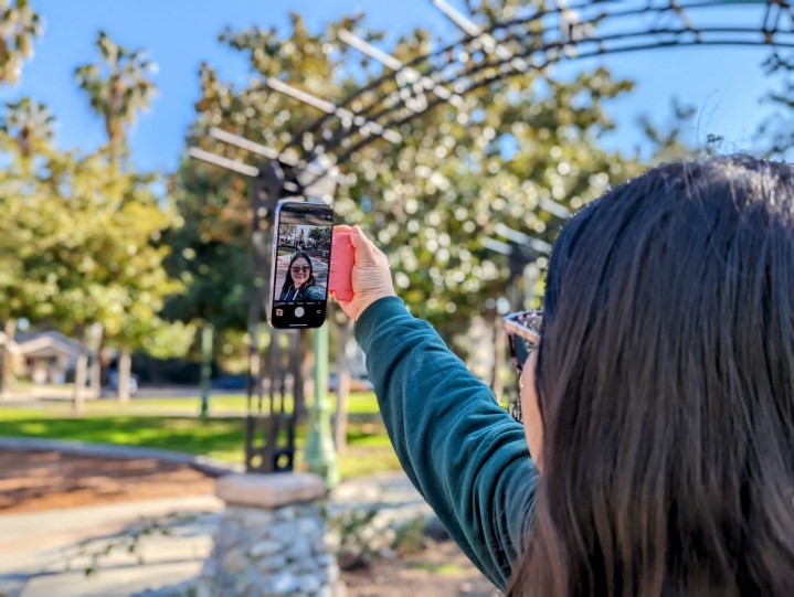 ShiftCam SnapGrip held in one hand for vertical selfie