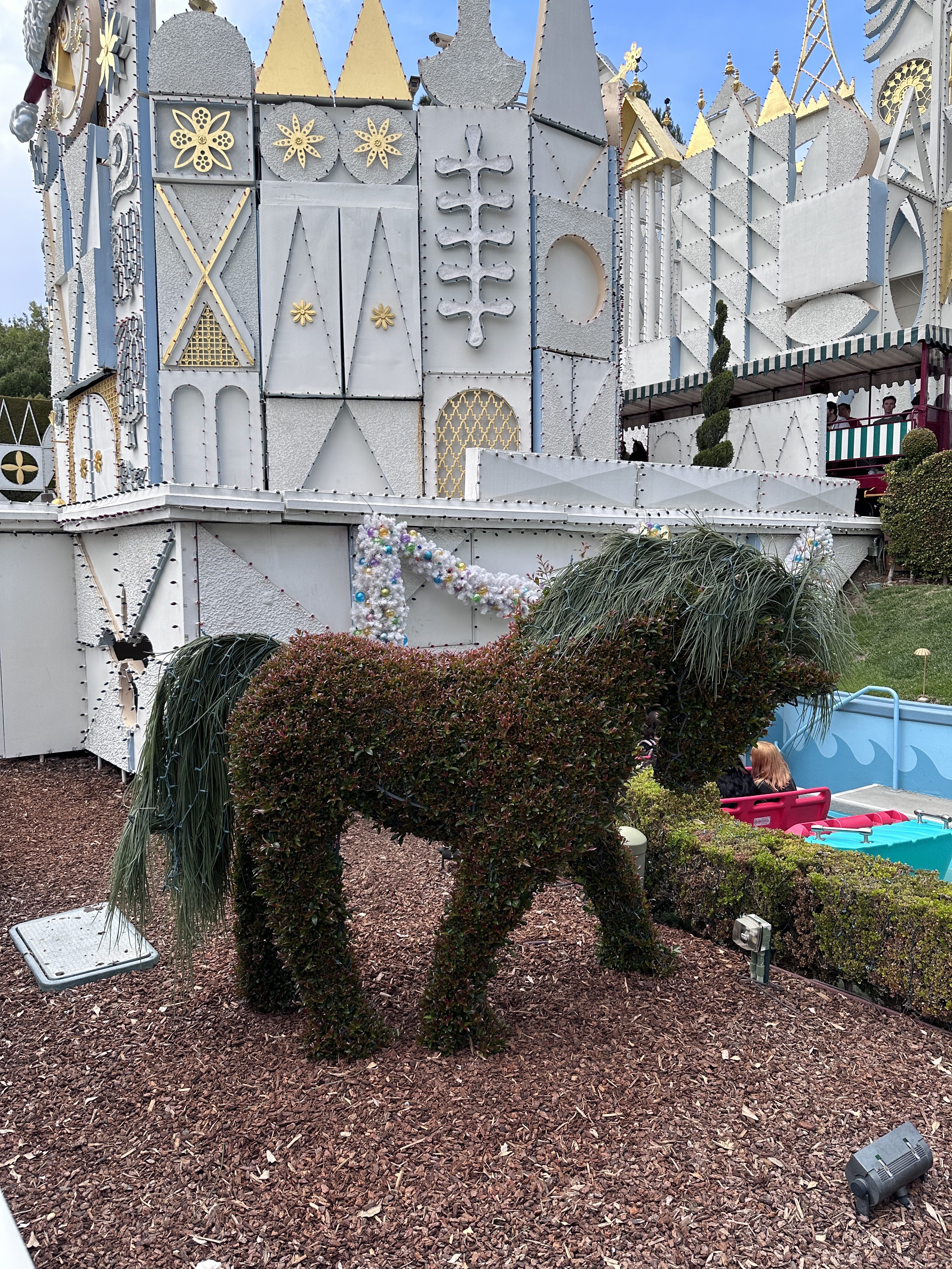 pony hedge at it's a small world holiday cool photographic style