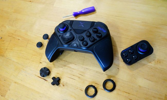 A Victrix Pro BFG and all its parts sit splayed out on a table.
