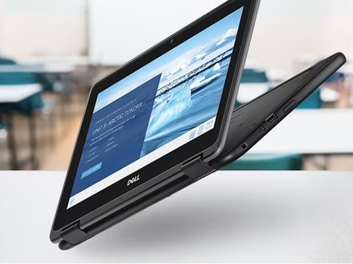 Dell Chromebook 3189 2-in-1 on a classroom desk floating in the air.