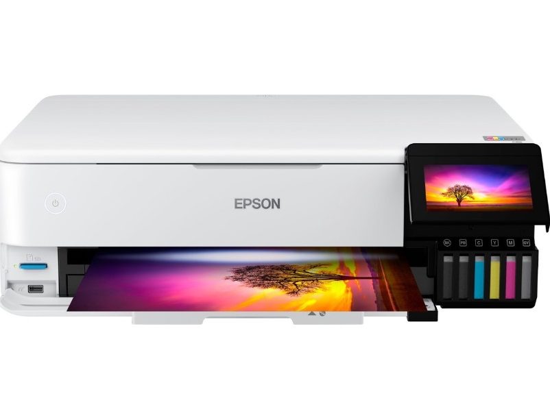 The Epson EcoTank Photo ET-8550 with a full color wide picture coming out of its tray.