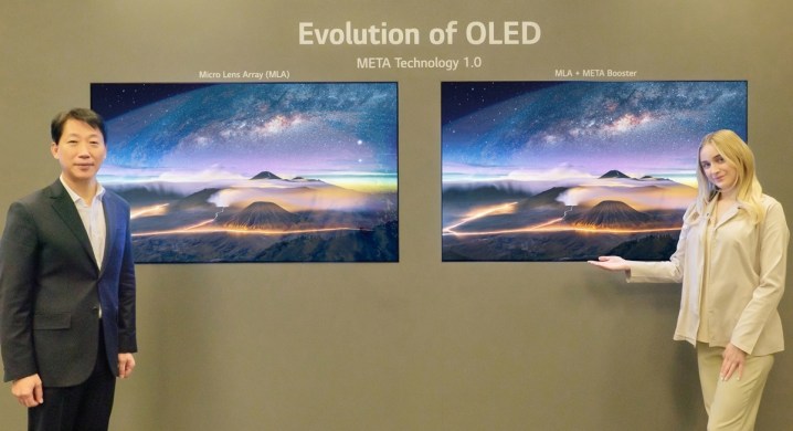Spokesmodels stand by screens showing LG Display's META OLED technology at CES 2023.