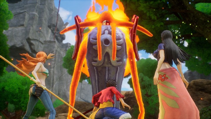 Luffy, Nami, and Nico Robin standing against a fire golem in One Piece Odyssey.