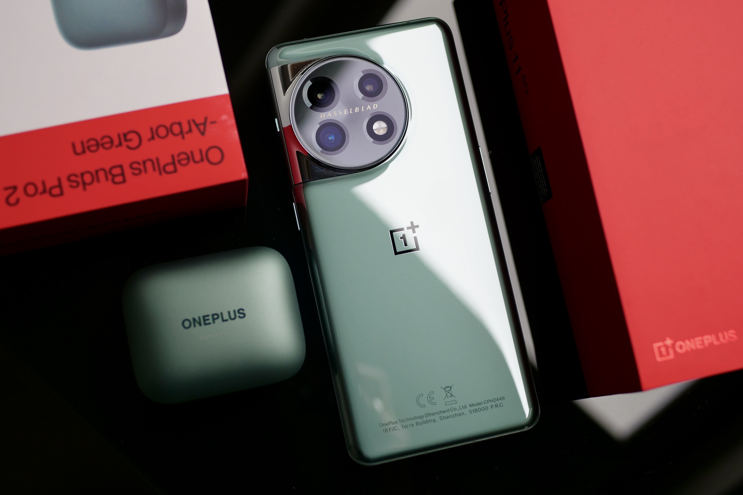 The OnePlus 11 and the OnePlus Buds Pro 2.