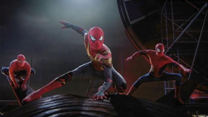 Three Spider-Men posing in Spider-Man: No Way Home.