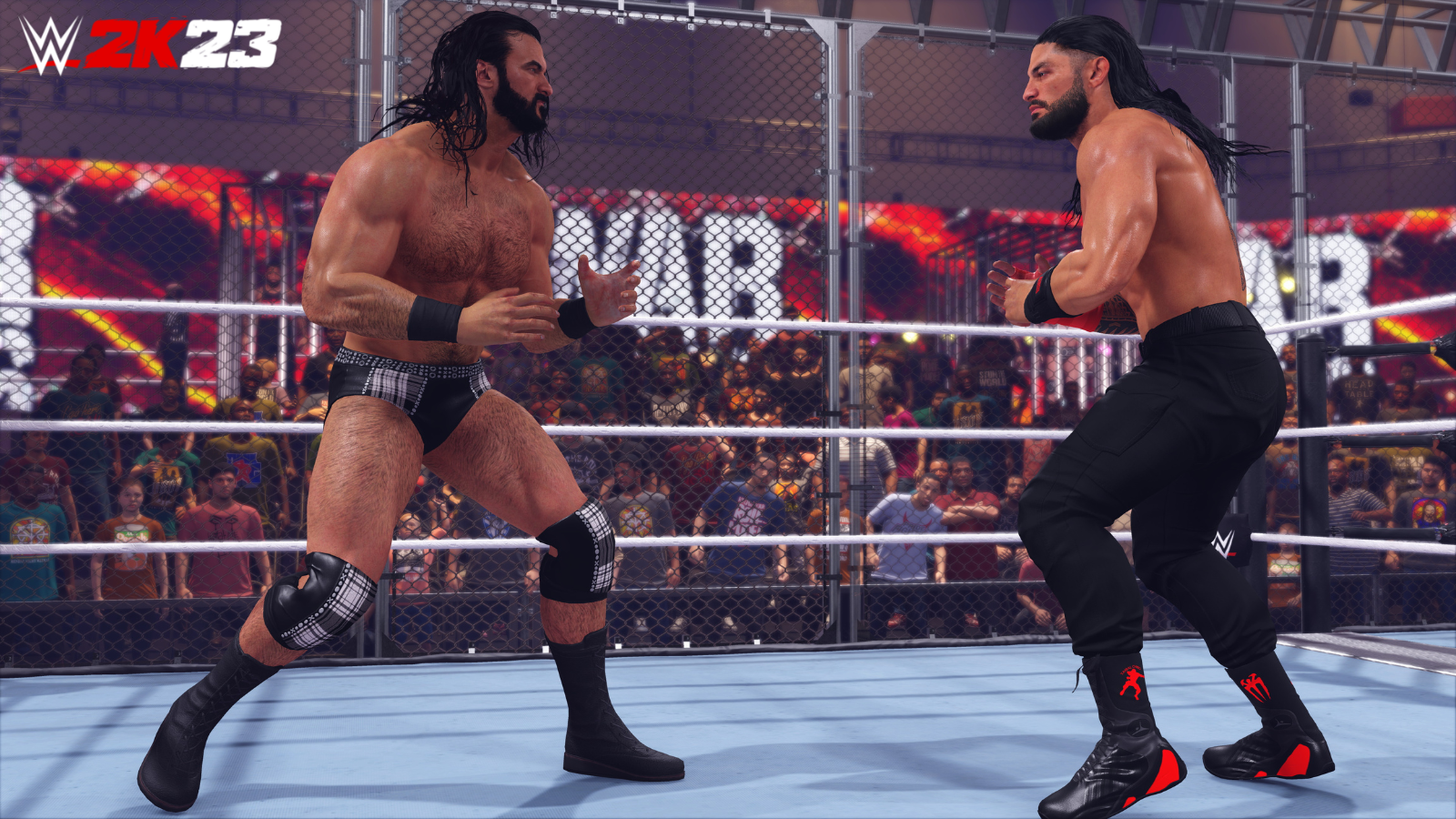 Drew McIntyre e Roman Reigns lutam dentro de WarGames em WWE 2K23.