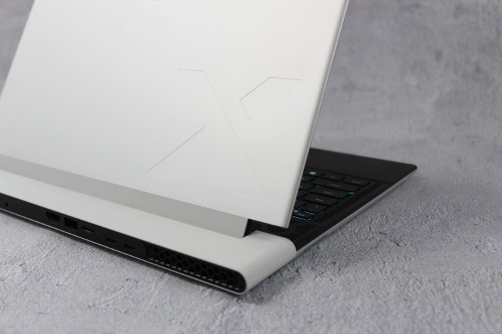 The lid of the Alienware x14 R2 against a grey background.