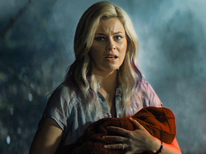 A woman holds a child in Brightburn.