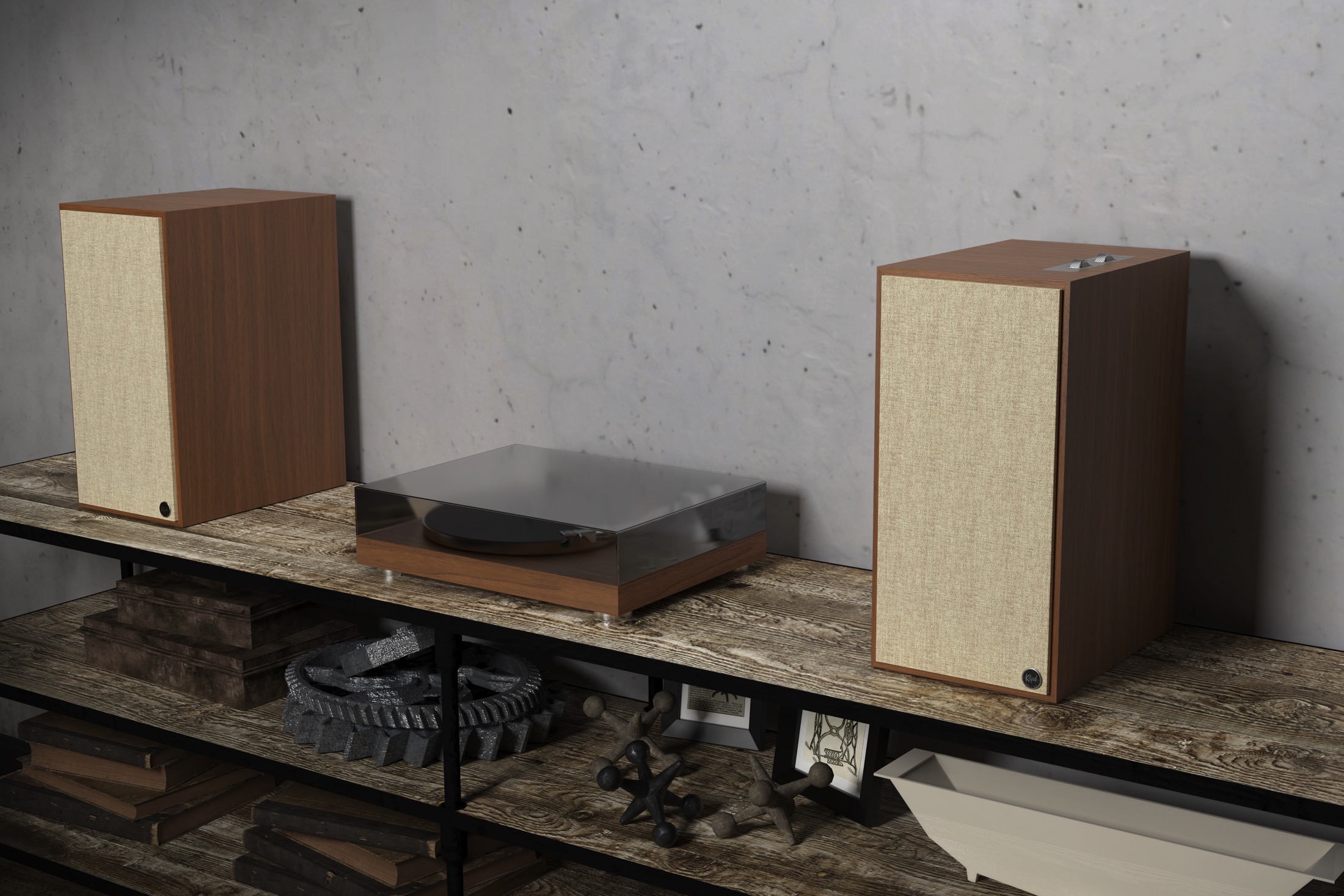 Klipsch The Nines in walnut finish next to a turntable.