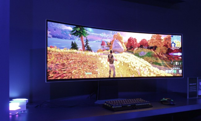 The Samsung Odyssey OLED 49 in a blue-tinted room.