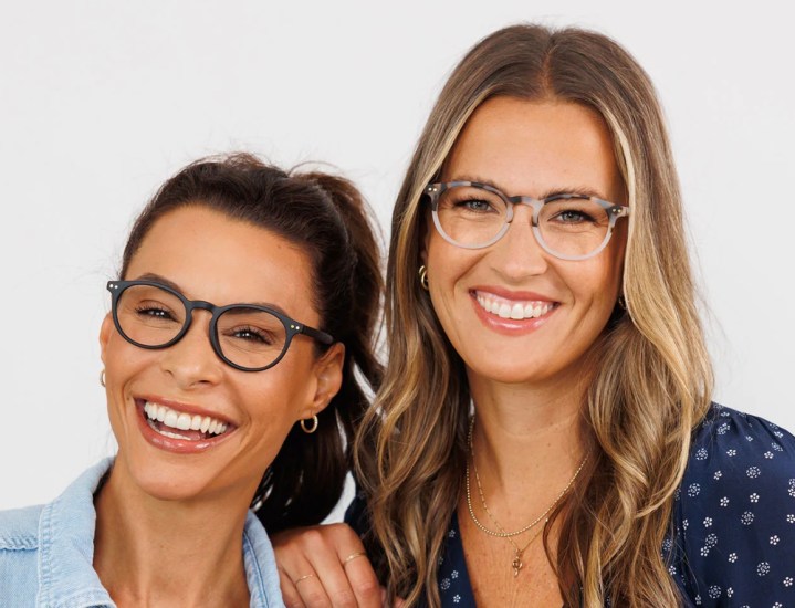 Two women wearing glasses.