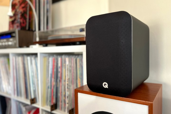 Q Acoustics M20 powered speaker system with a vinyl setup.