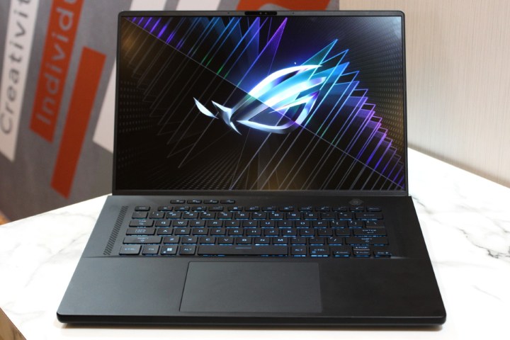 ROG Zephyrus M16 on a white table.