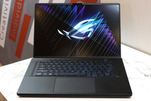 The ROG Zephyrus M16 on a white table.
