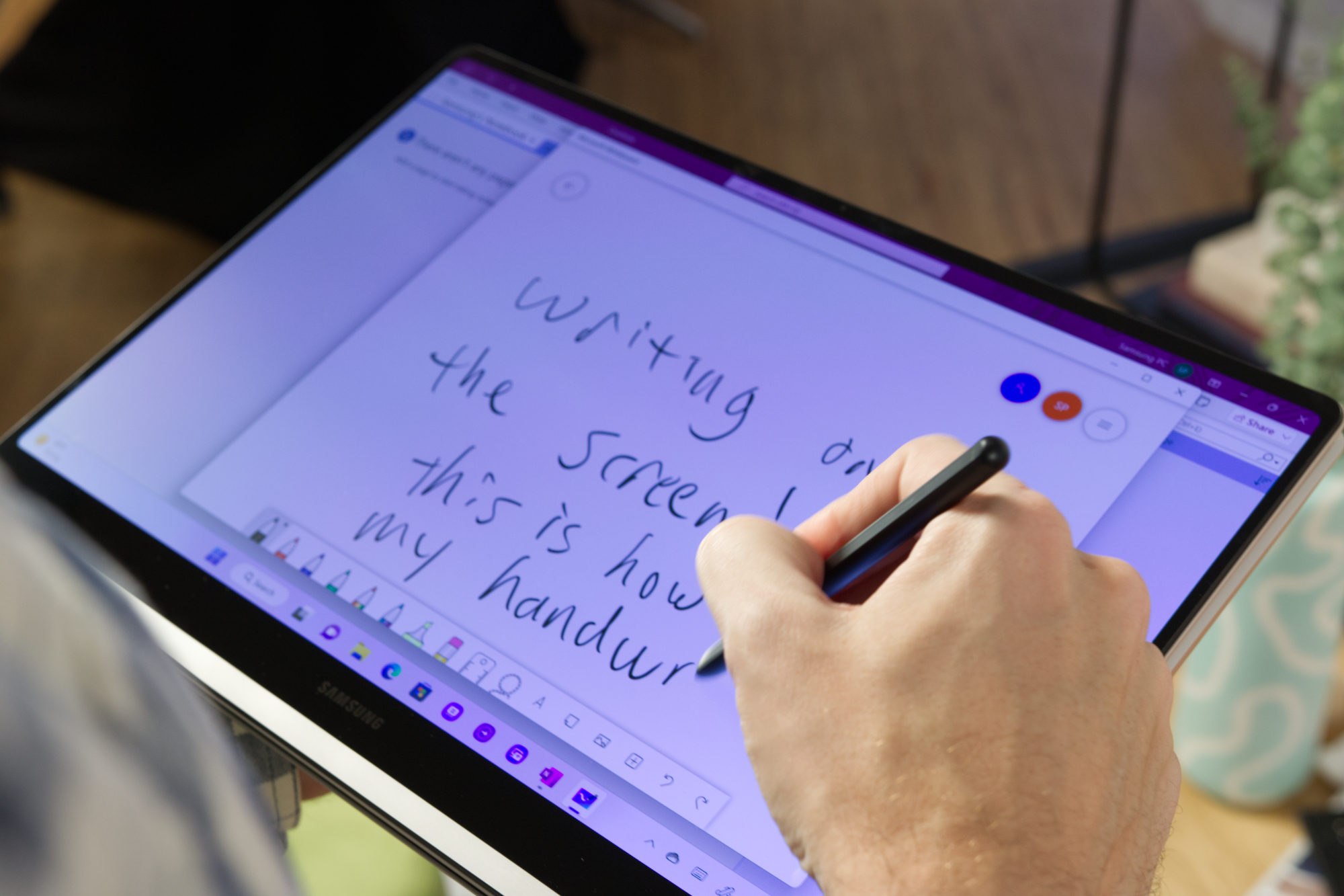 Writing on the Samsung Galaxy Book 3 Pro 360 with a stylus.