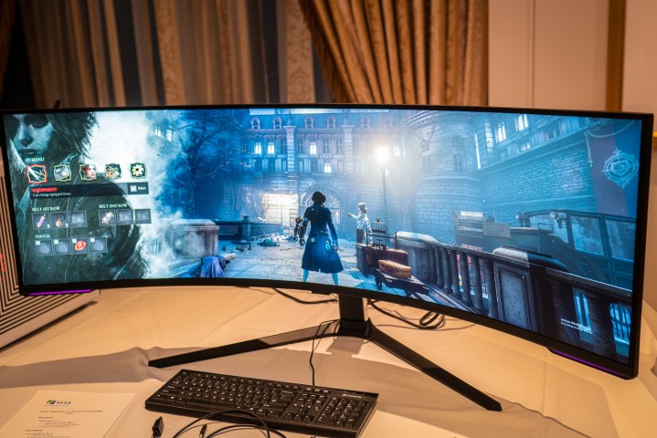 Playing a game on the Samsung Odyssey Neo G9 gaming monitor.