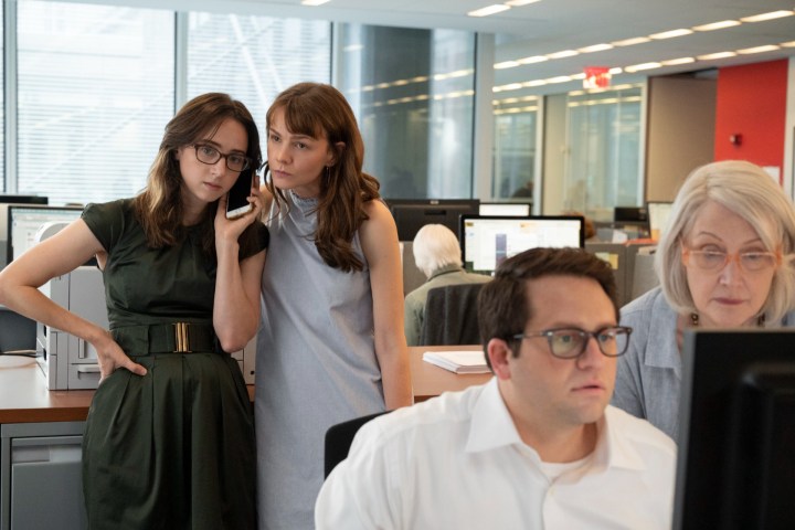 Journalists work in a newsroom in She Said.