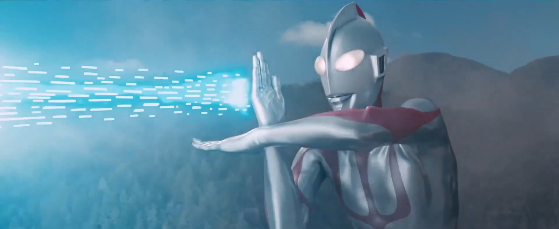 Ultraman mantém seus antebraços juntos para criar seu raio Spacium, que dispara na frente dele.