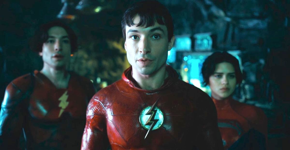 The Flash stands with two heroes behind him in The Flash.