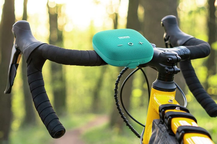 The Tribit StormBox 2 Bluetooth speaker mounted on a bike.