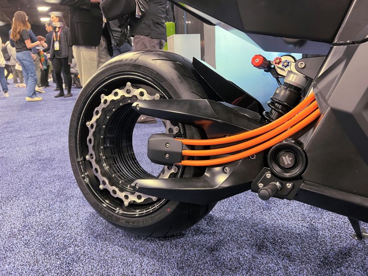 The entire rim of the rear motorcycle wheel acts as a motor, eliminating the need for a chain or belt to drive the wheel.