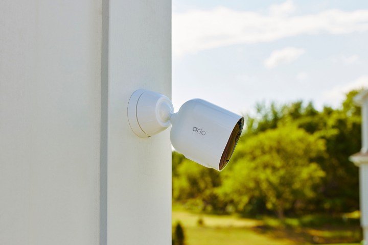 The Arlo Pro 5S installed outside on a wall.