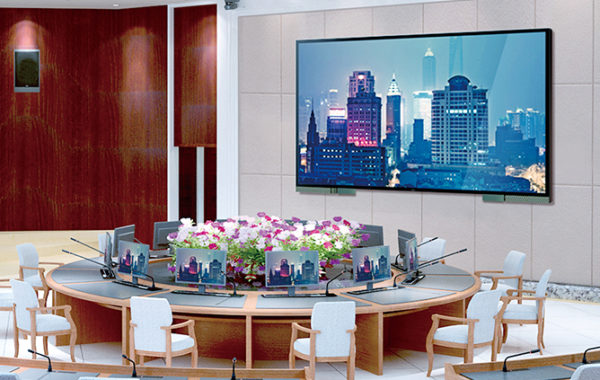 A BOE 8K display mounted to a wall.